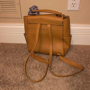 dooney and bourke plastic zipper